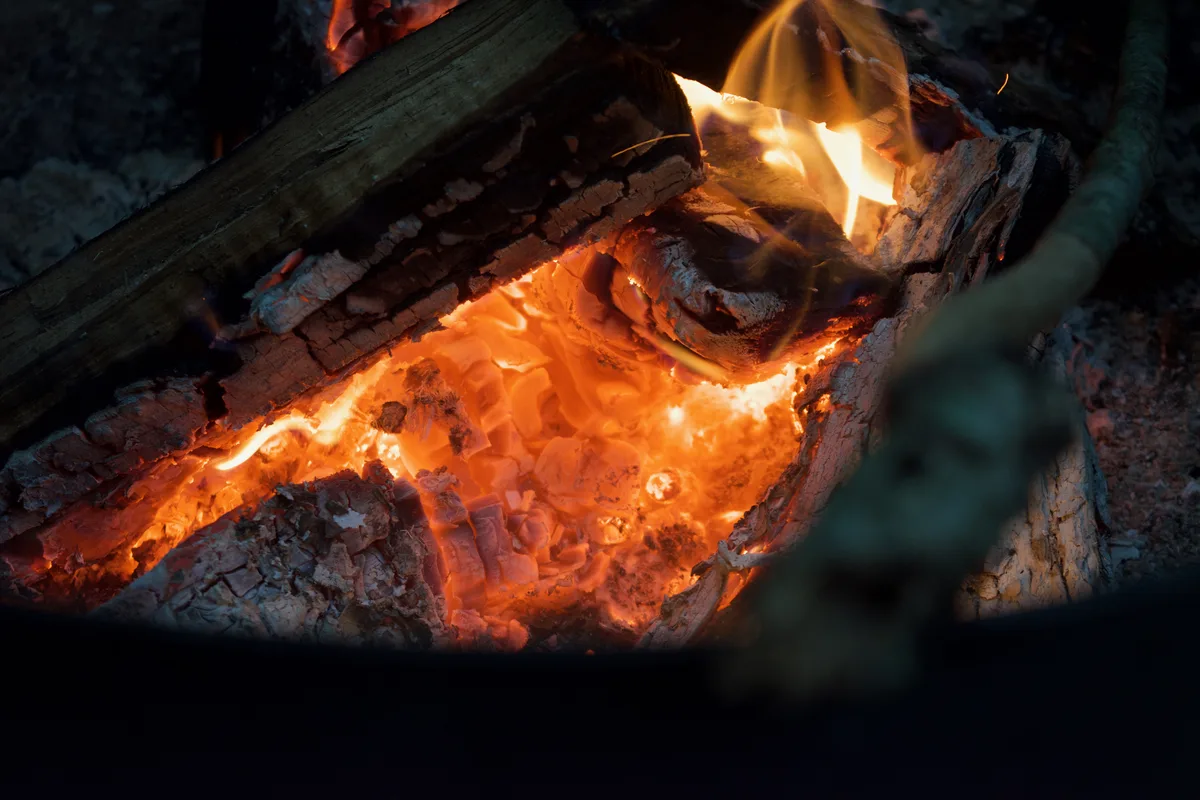 CLose up image of embers in a camp fire