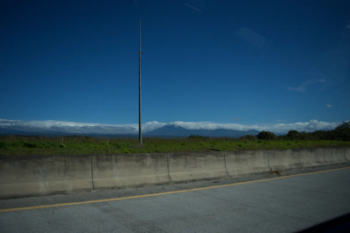The view from a highway looking out at mountains