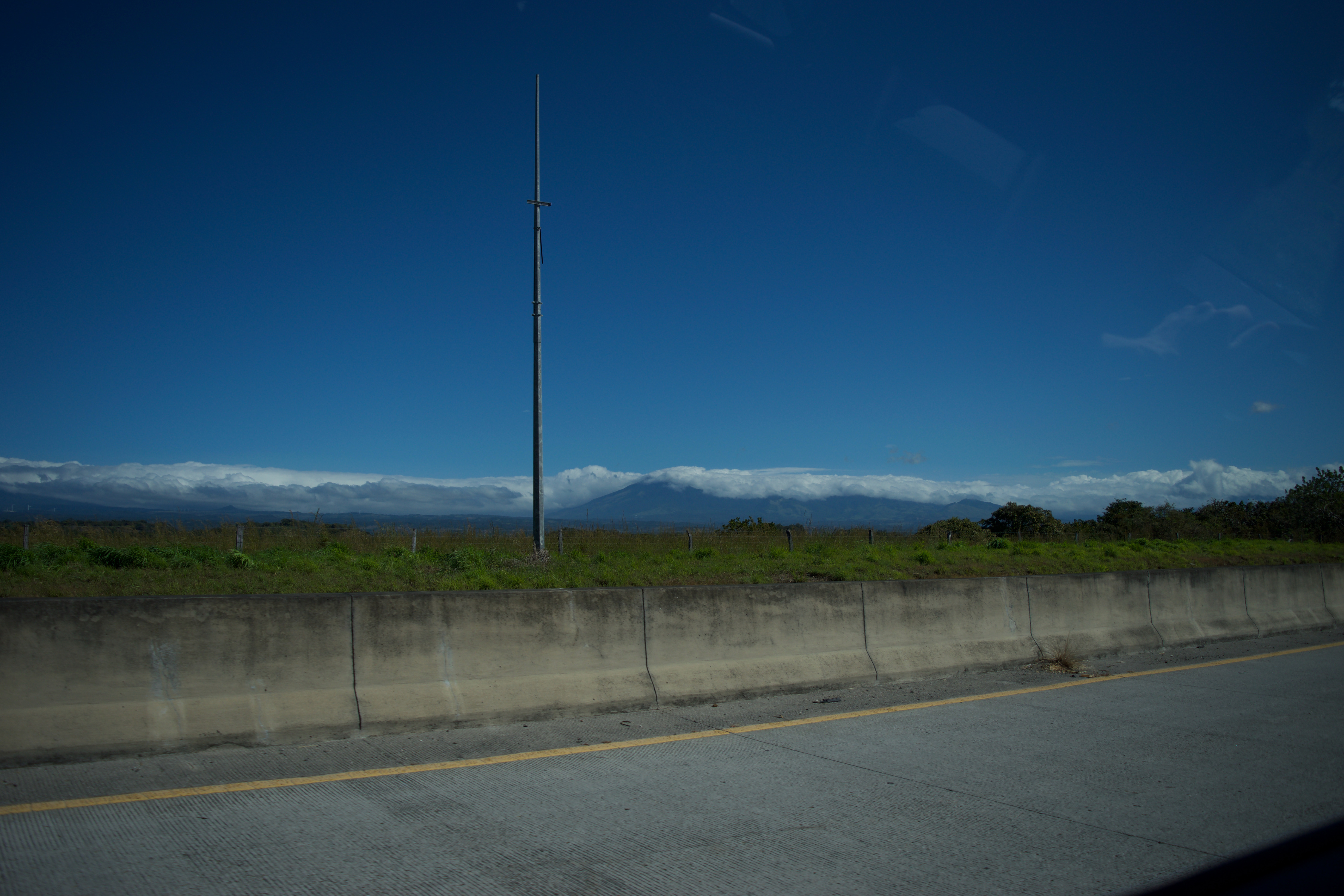 The view from a highway looking out at mountains