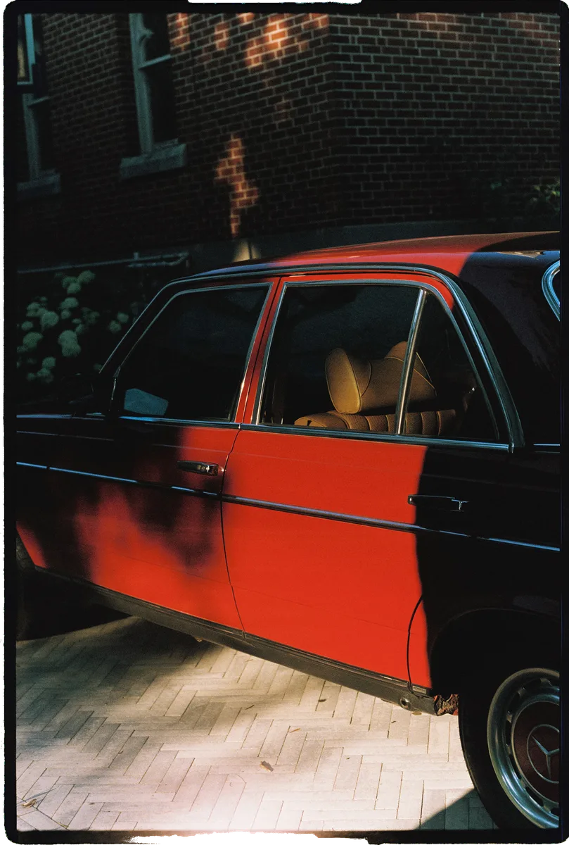 A bright red vintage Mercedes