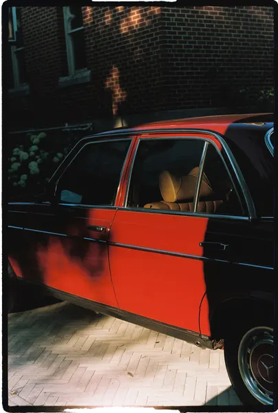 A bright red vintage Mercedes